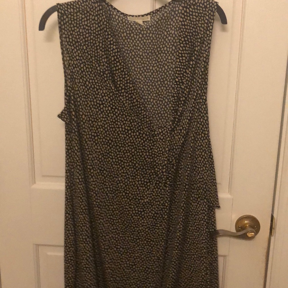 Black dress with tan dots.